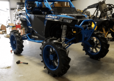 An ATV is similar to a dirt bike